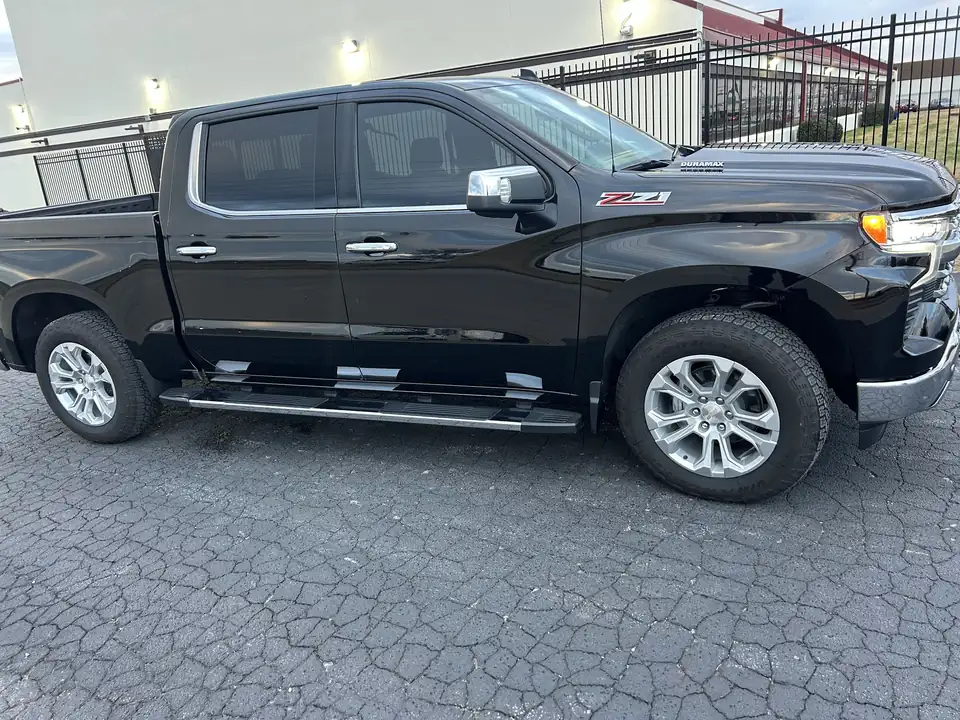 Black Chevrolet Silverado Z71 side profile after a detail